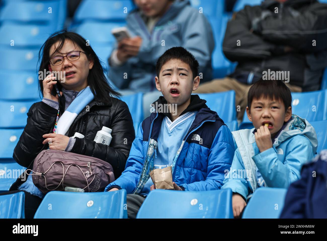 Fans arrive ahead of the Premier League match Manchester City vs Arsenal at Etihad Stadium, Manchester, United Kingdom. 31st Mar, 2024. (Photo by Mark Cosgrove/News Images) in, on 3/31/2024. (Photo by Mark Cosgrove/News Images/Sipa USA) Credit: Sipa USA/Alamy Live News Stock Photo