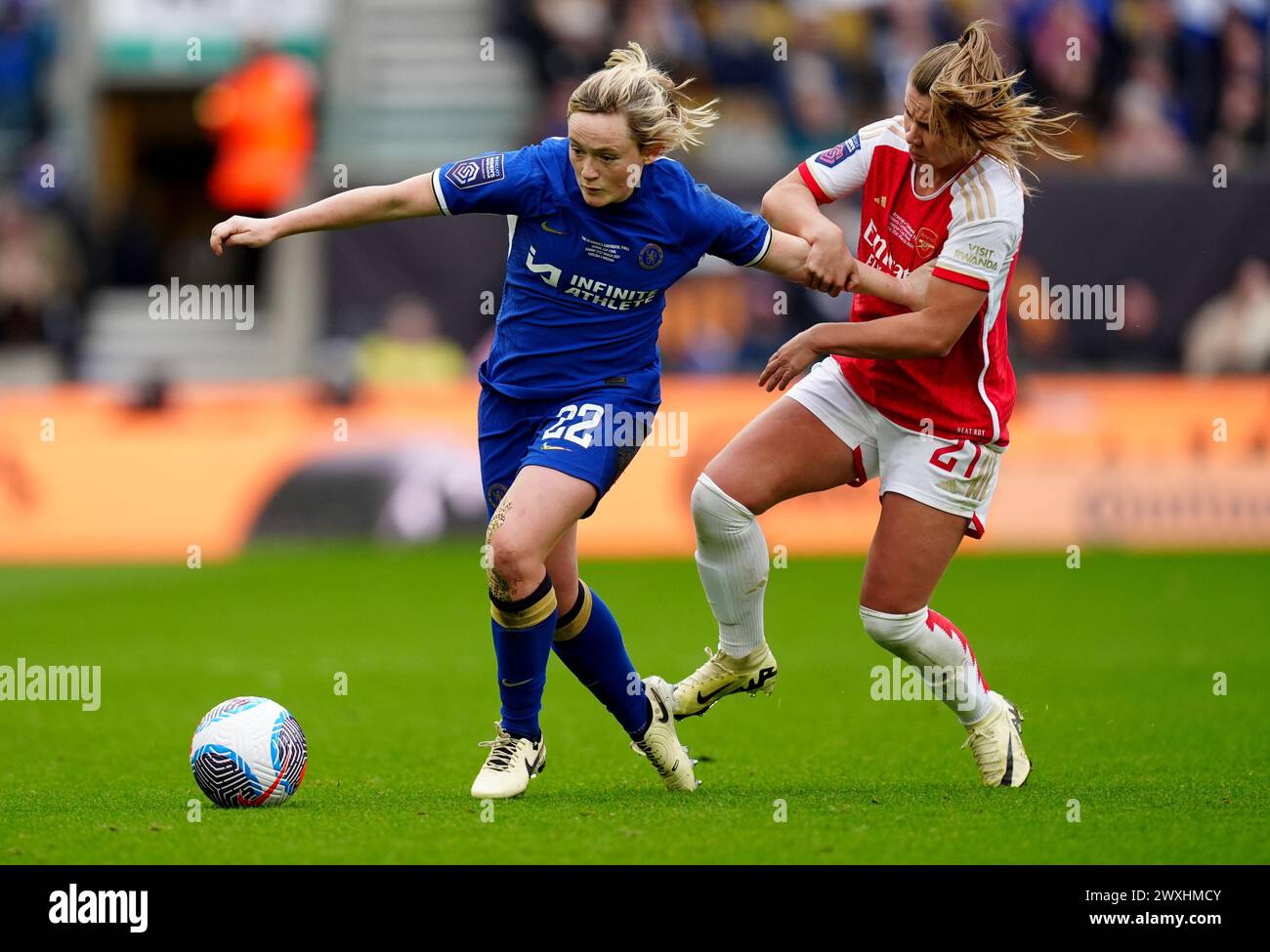 Chelsea's Erin Cuthbert battles for the ball against Arsenal's Victoria Pelova during the FA Women's Continental Tyres League Cup Final at Molineux Stadium, Wolverhampton. Picture date: Sunday March 31, 2024. Stock Photo