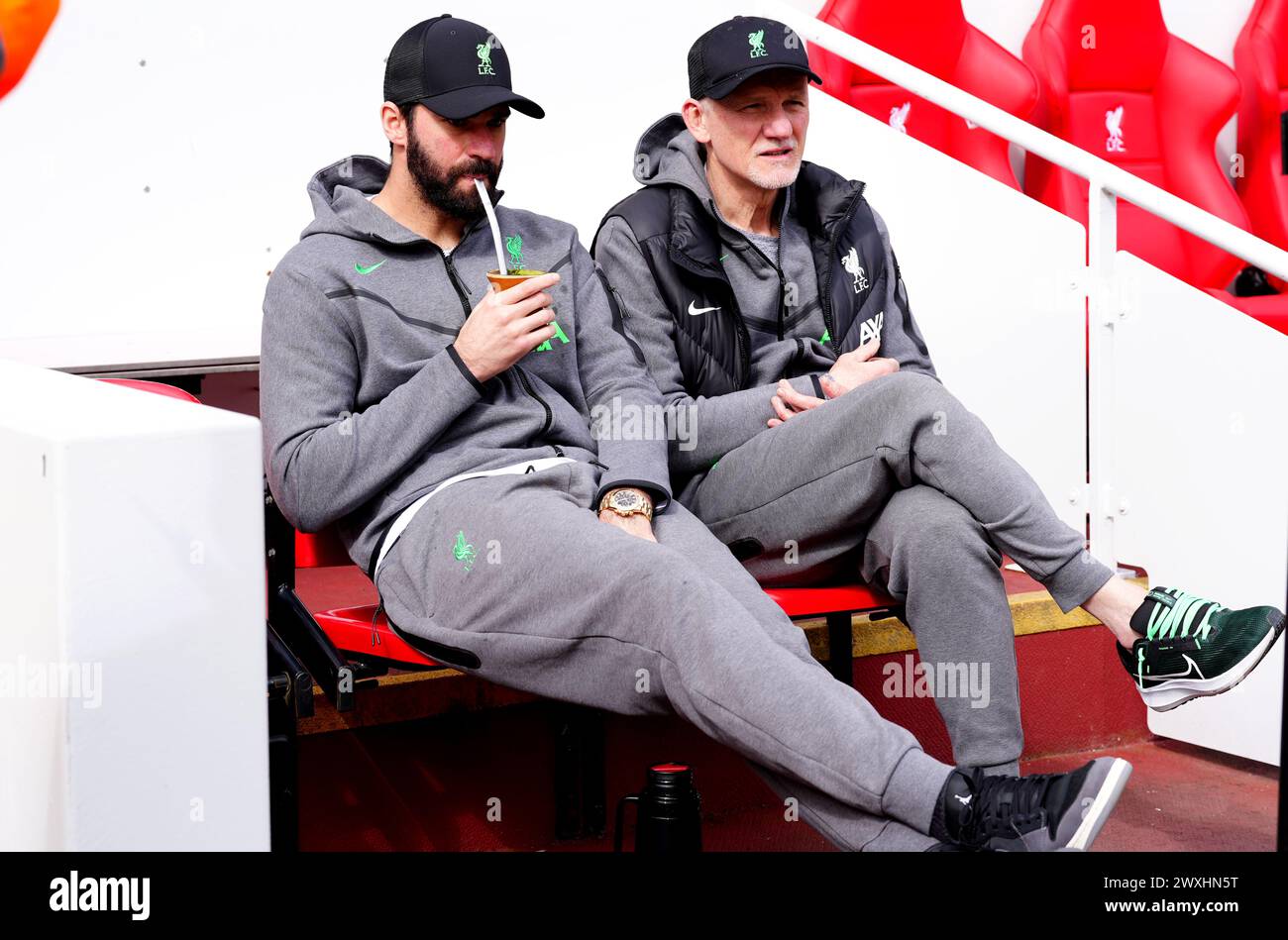 Liverpool goalkeeper Alisson Becker (left) and goalkeeping coach Claudio Taffarel ahead of the Premier League match at Anfield, Liverpool. Picture date: Sunday March 31, 2024. Stock Photo