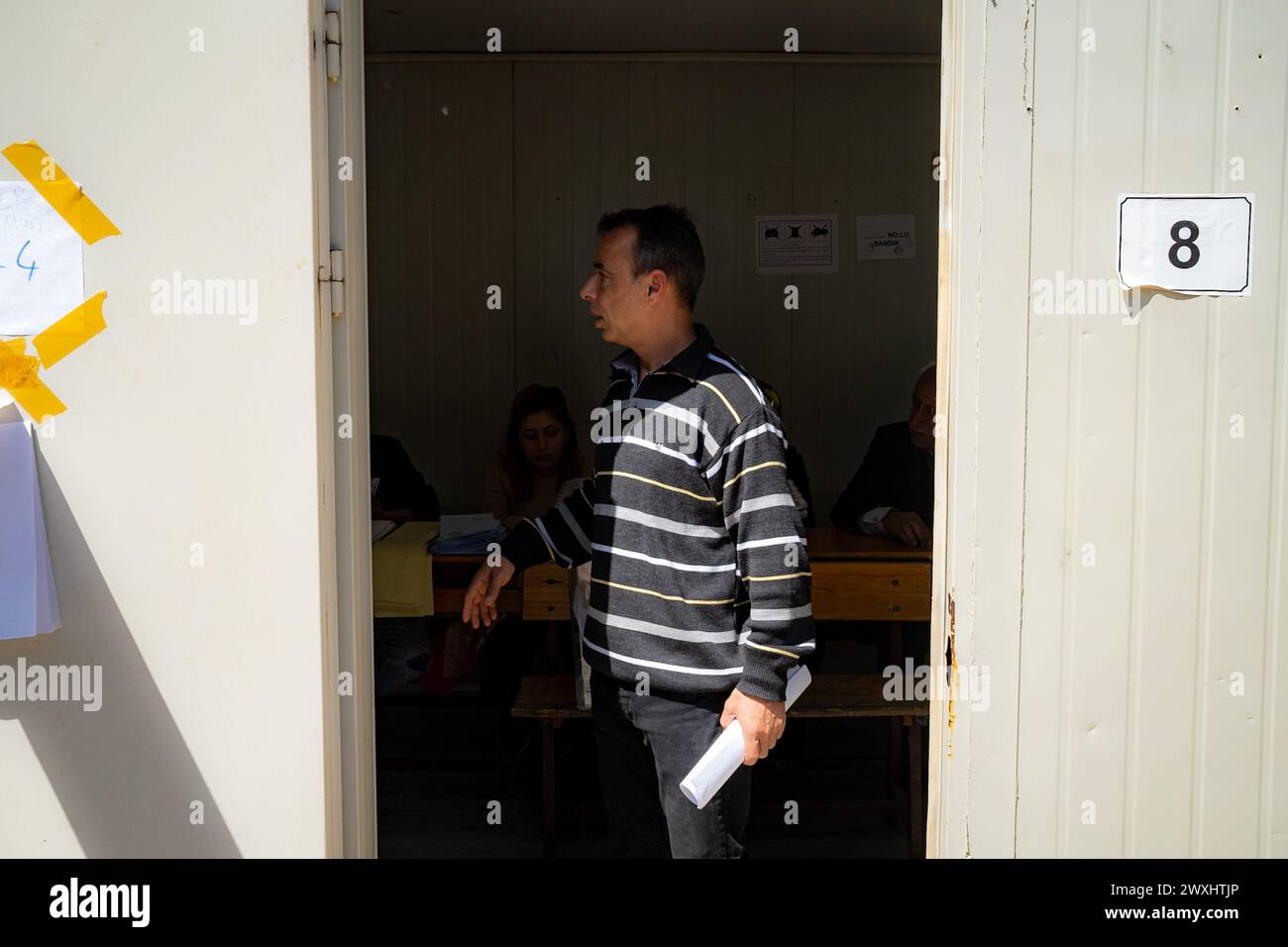 Hatay, Turkey. 31st Mar, 2024. An official seen at the polling station during the 2024 Turkish local elections. Voting for the local elections on March 31, 2024 has started in Antakya district of Hatay, an earthquake zone. People in the region are seen voting. Credit: SOPA Images Limited/Alamy Live News Stock Photo