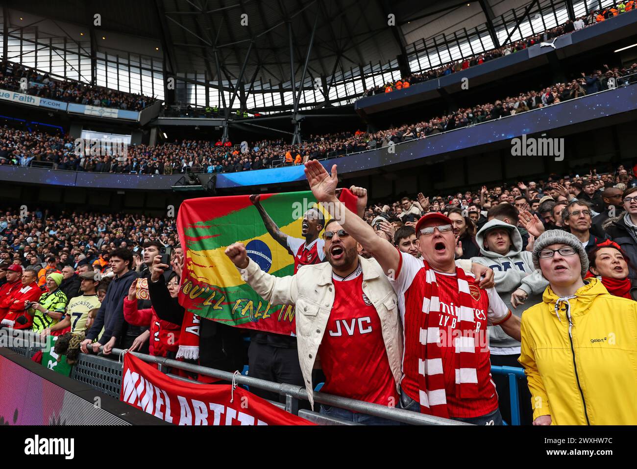 Arsena fans during the Premier League match Manchester City vs Arsenal at Etihad Stadium, Manchester, United Kingdom. 31st Mar, 2024. (Photo by Mark Cosgrove/News Images) in, on 3/31/2024. (Photo by Mark Cosgrove/News Images/Sipa USA) Credit: Sipa USA/Alamy Live News Stock Photo
