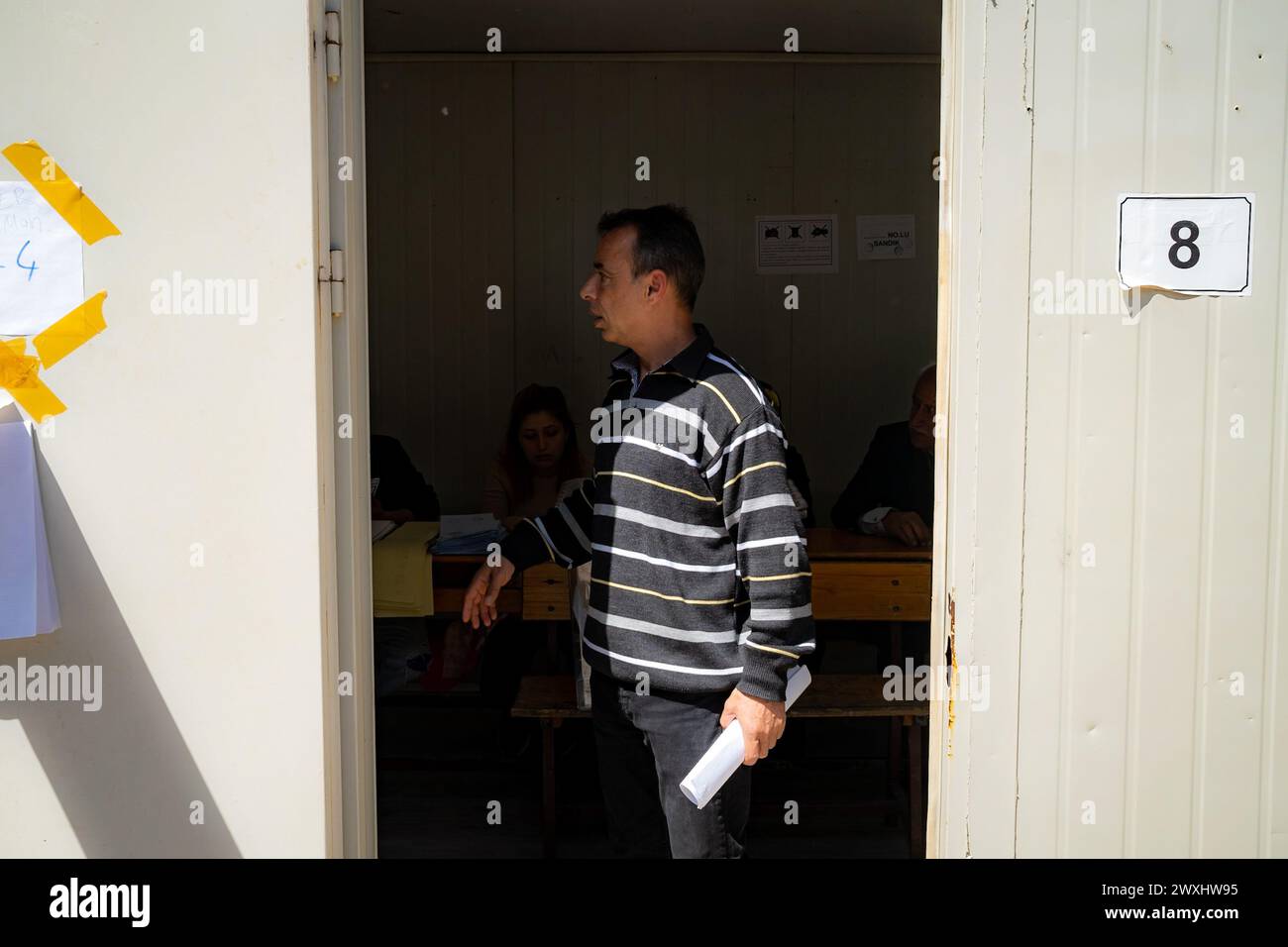 An official seen at the polling station during the 2024 Turkish local elections. Voting for the local elections on March 31, 2024 has started in Antakya district of Hatay, an earthquake zone. People in the region are seen voting. (Photo by Murat Kocabas / SOPA Images/Sipa USA) Stock Photo