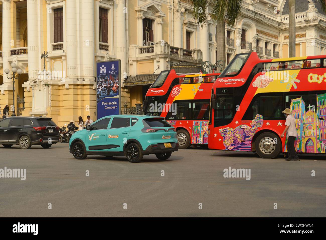 Vinfast electric taxis appear throughout major cities in Vietnam. 베트남 전기차, ベトナムの電気自動車, वियतनामी इलेक्ट्रिक कारें, 越南电动汽车 Xanh SM Taxi Stock Photo