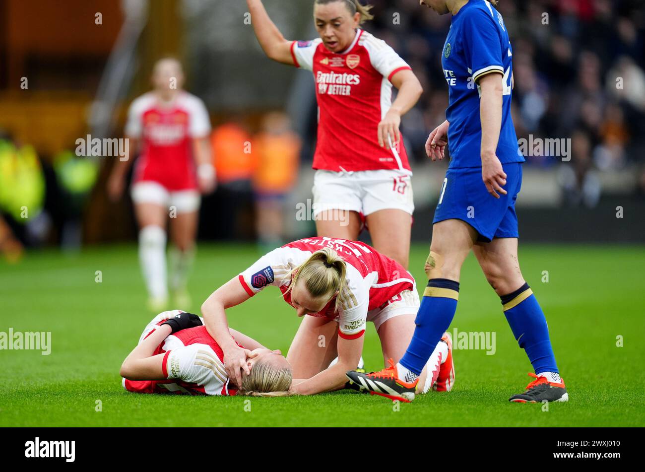 Arsenal's Stina Blackstenius checks on team mate Frida Maanum after she goes down during the FA Women's Continental Tyres League Cup Final at Molineux Stadium, Wolverhampton. Picture date: Sunday March 31, 2024. Stock Photo