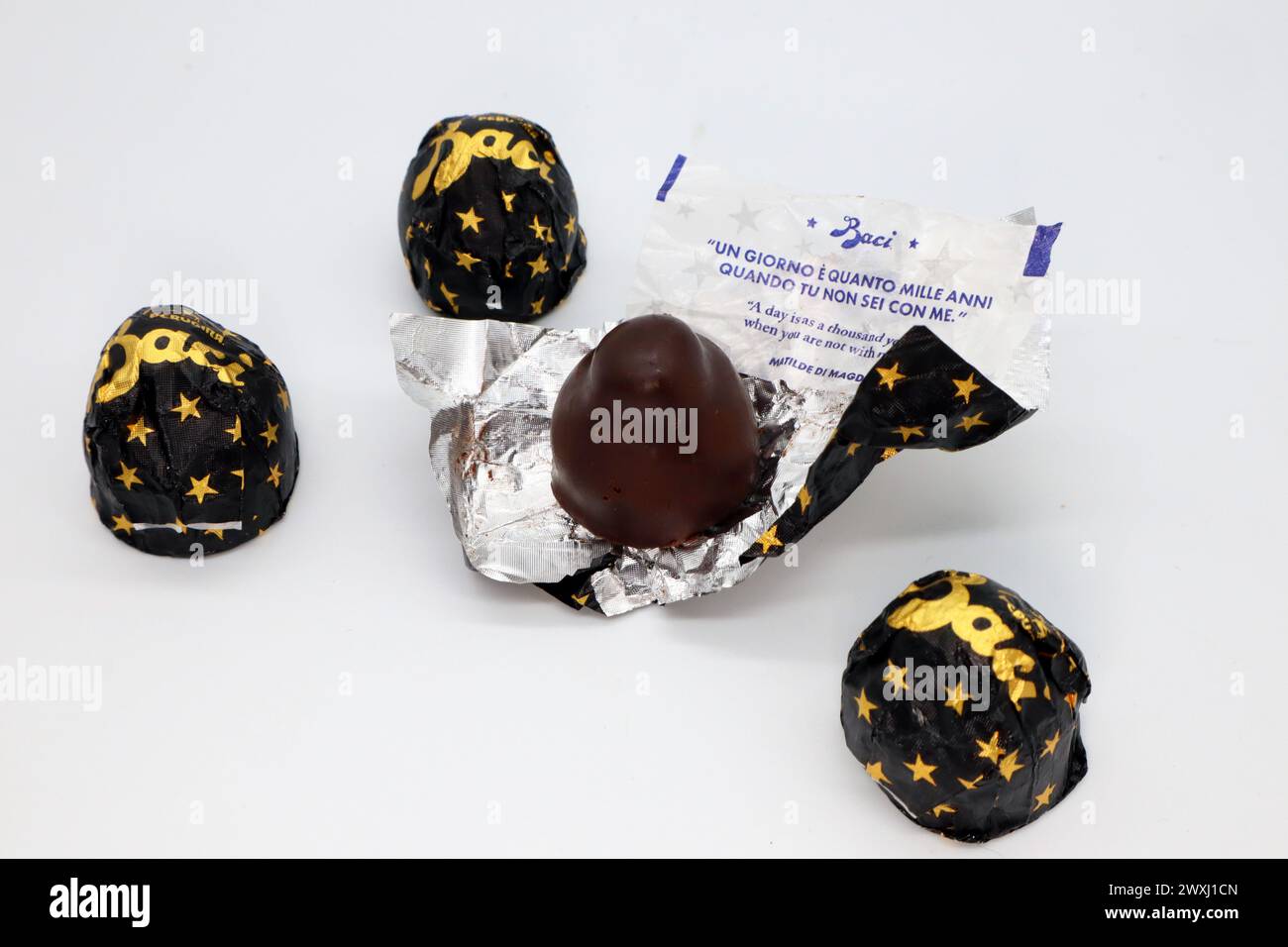 Baci Perugina Chocolate with hazelnut grains and whole hazelnut coated ...