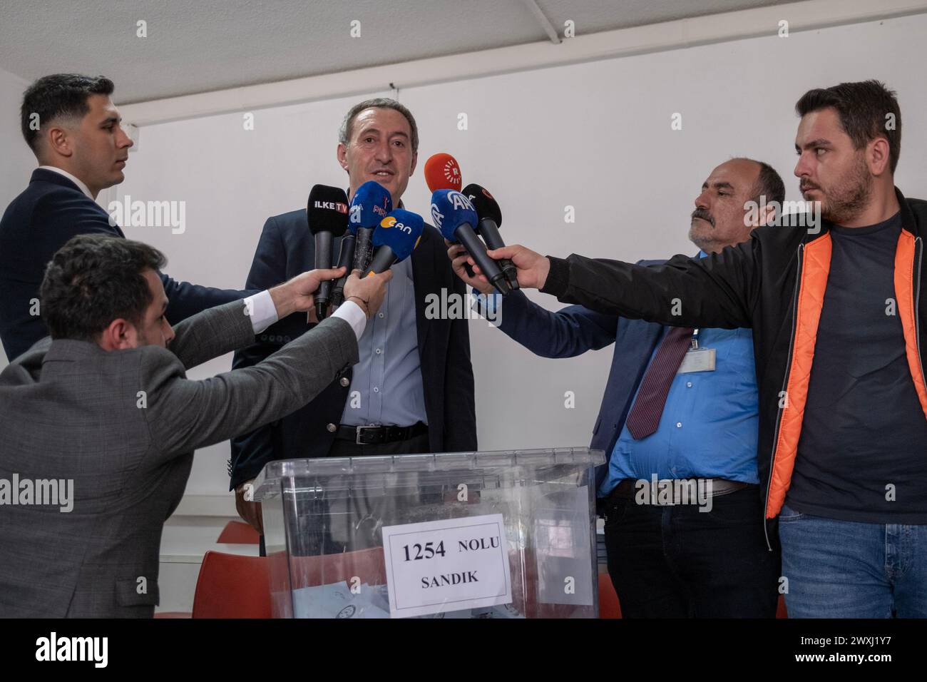 Ankara, Turkey. 31st Mar, 2024. Tuncer Bakirhan, Co-Chairman of the People's Equality and Democracy Party (DEM Party) speaks to the press at a polling station during the 2024 Turkish local elections. Turkish people polling stations to elect their local administrators who will serve for 5 years. More than 61 million voters voted, in approximately 208 thousand ballot boxes. While voting start at 08.00 in the morning in Ankara, thousands of citizens go to the polls early in the morning to vote. Credit: SOPA Images Limited/Alamy Live News Stock Photo