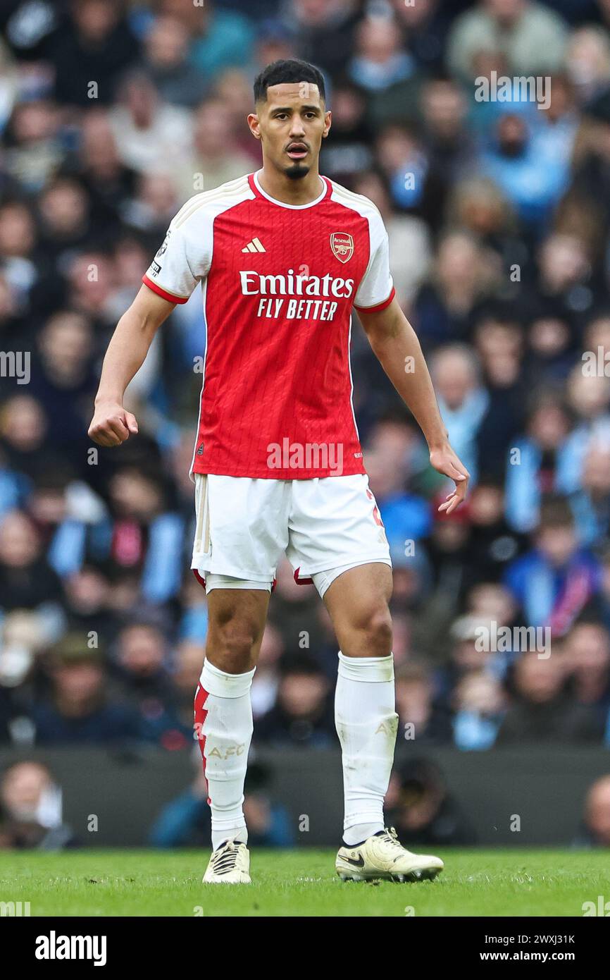 William Saliba of Arsenal during the Premier League match Manchester City vs Arsenal at Etihad Stadium, Manchester, United Kingdom, 31st March 2024  (Photo by Mark Cosgrove/News Images) Stock Photo