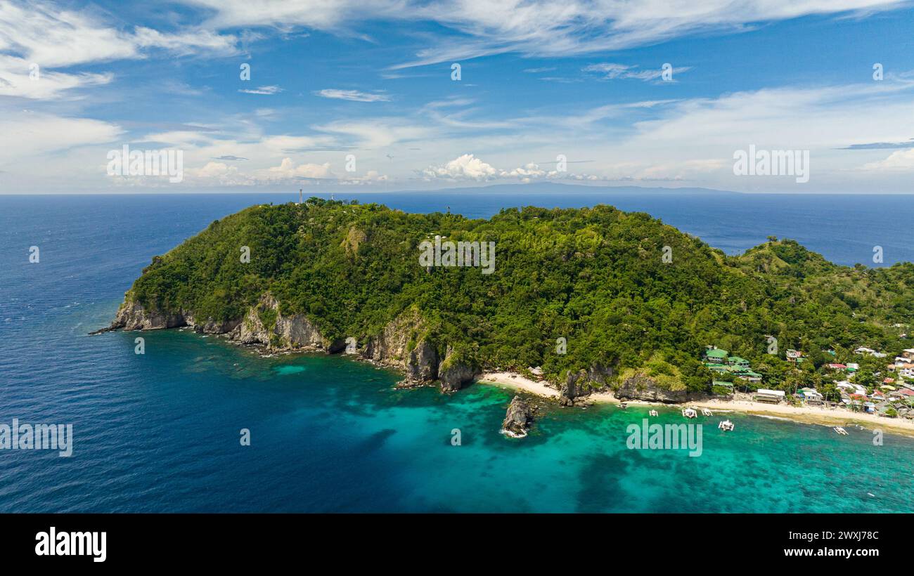 Top view of Apo Island with a beautiful beach and marine reserve ...