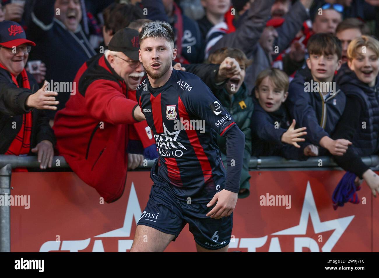 Liege, Belgium. 31st Mar, 2024. Liege's Ryan Dylan Merlen celebrates after scoring during a soccer match between RFC Liege and SK Beveren, Sunday 31 March 2024 in Liege, on day 27/30 of the 2023-2024 'Challenger Pro League' second division of the Belgian championship. BELGA PHOTO BRUNO FAHY Credit: Belga News Agency/Alamy Live News Stock Photo