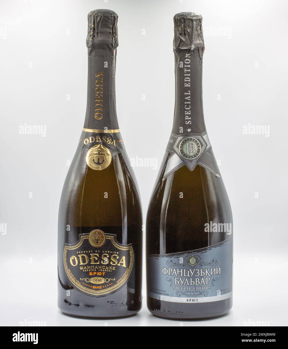 Kyiv, Ukraine - August 16, 2023: Odessa and French Boulevard brut Ukrainian sparkling wine bottles closeup on white. Stock Photo