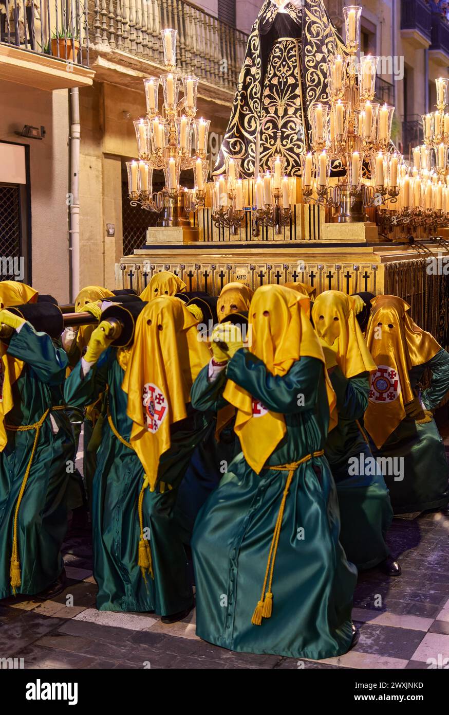 Nighttime Procession with Candlelit Structure in Urban Setting Stock ...