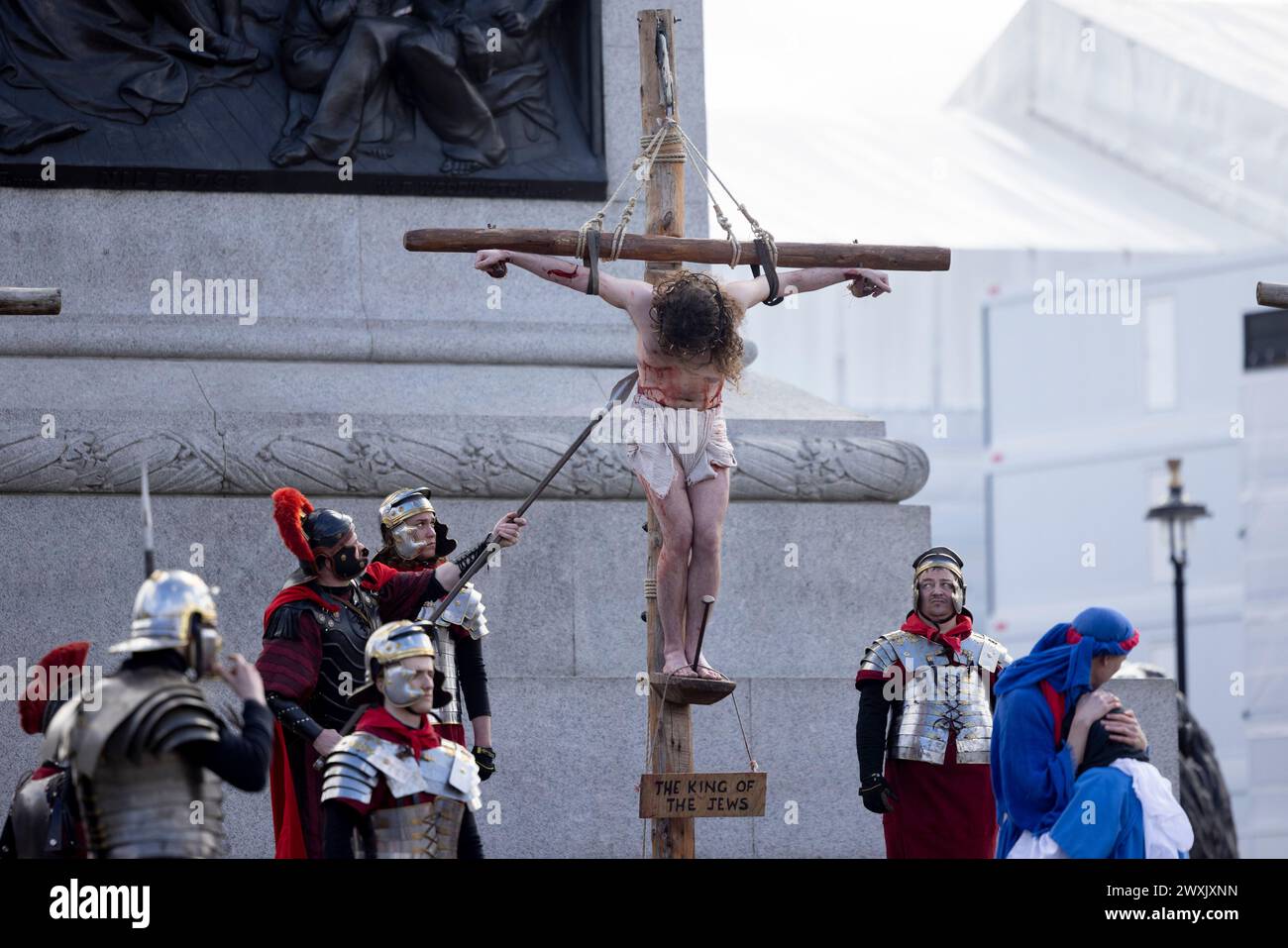 London, UK. 29th Mar, 2024. Peter Bergin who acts as Jesus Christ in this year performance, is crucified as per the Bible during the performance. An annual live performance of the 'Passion of Jesus', which depicts the final days of Jesus, by the Wintershall players theatrical production was being play on Good Friday at Trafalgar Square. (Photo by Hesther Ng/SOPA Images/Sipa USA) Credit: Sipa USA/Alamy Live News Stock Photo
