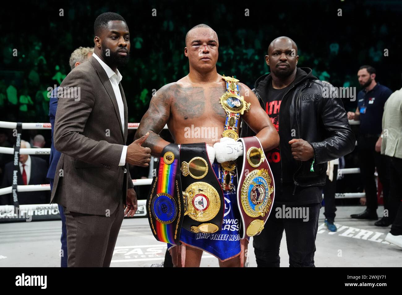 Fabio Wardley poses with his belts after his fight against Frazer ...