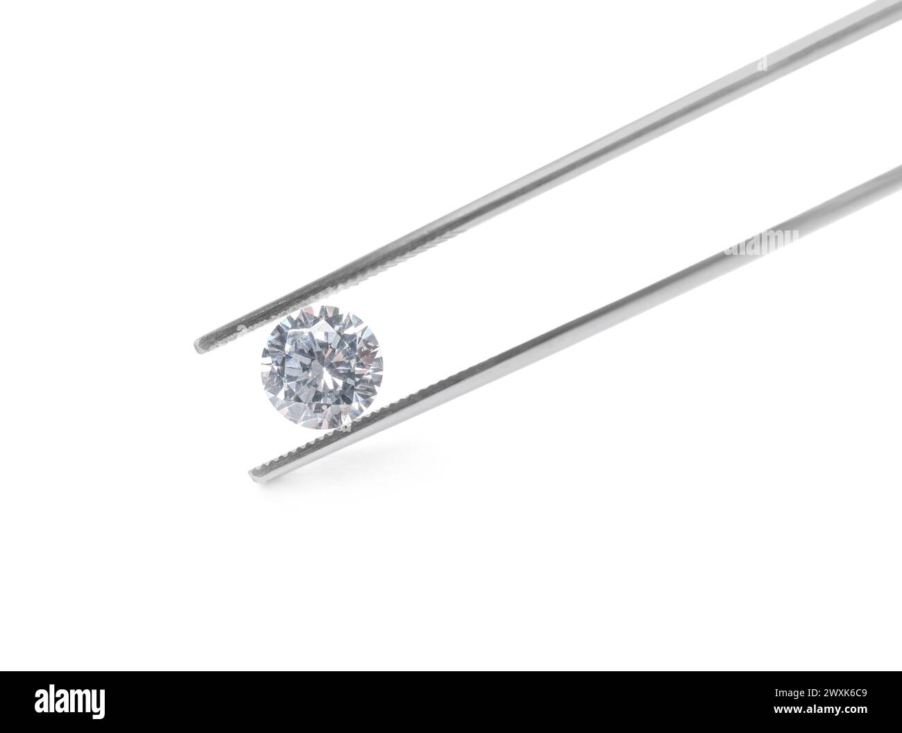 Tweezers with beautiful shiny diamond isolated on white Stock Photo - Alamy