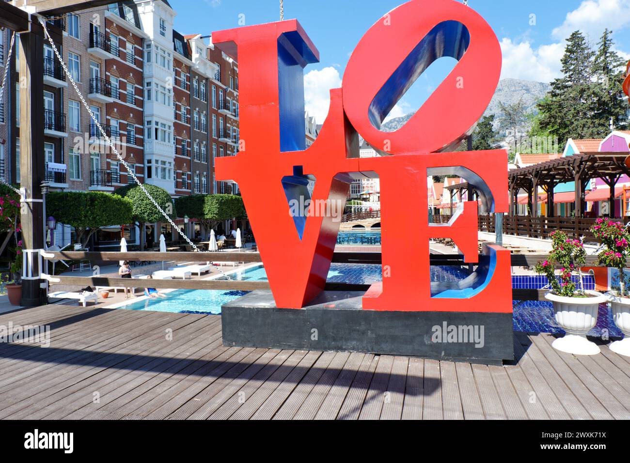 'LOVE' written with capital red letters outdoor as photo background and decoration Stock Photo