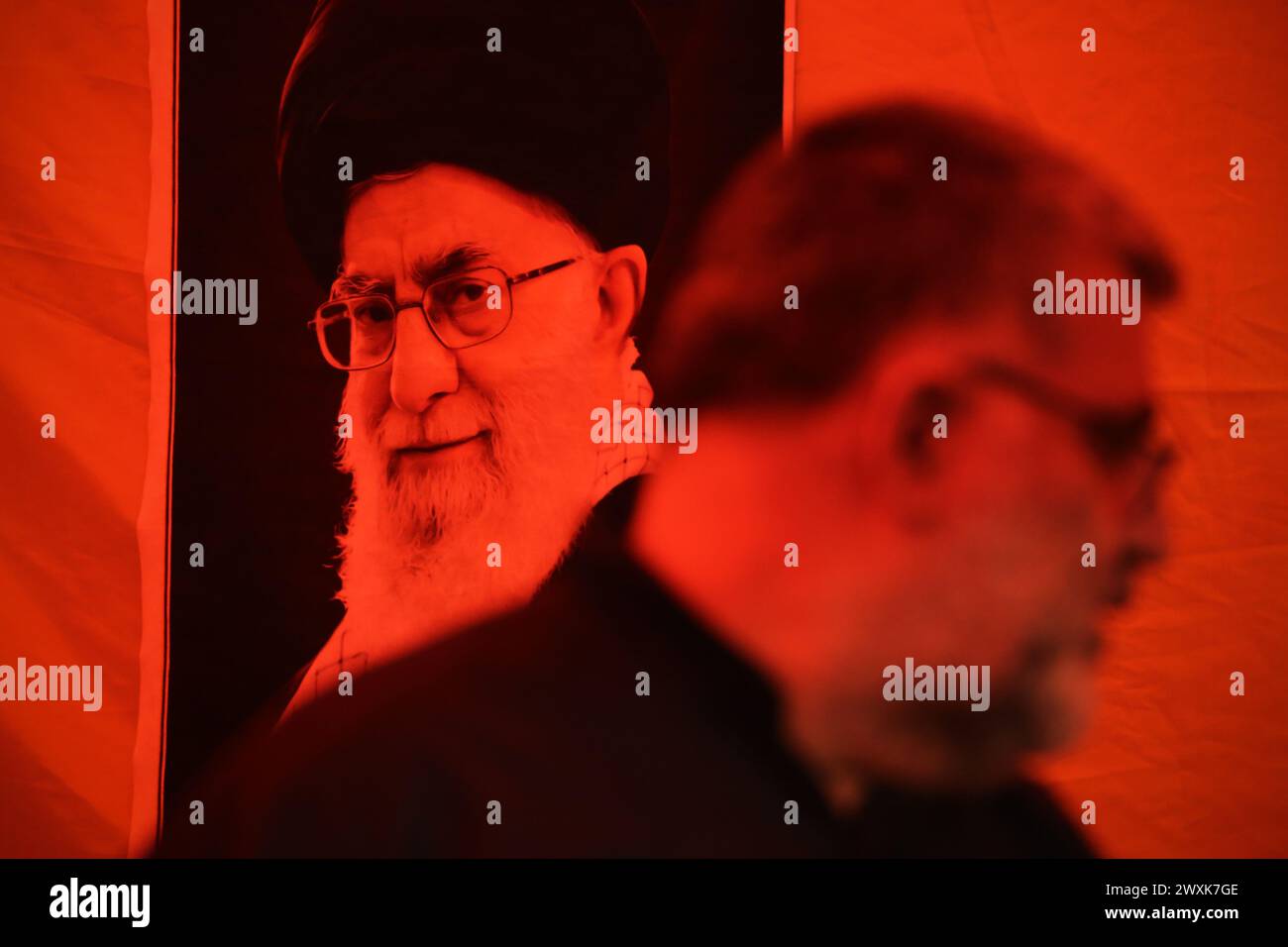 tehran-iran-march-31-2024-tehran-iran-an-iranian-man-stands-next