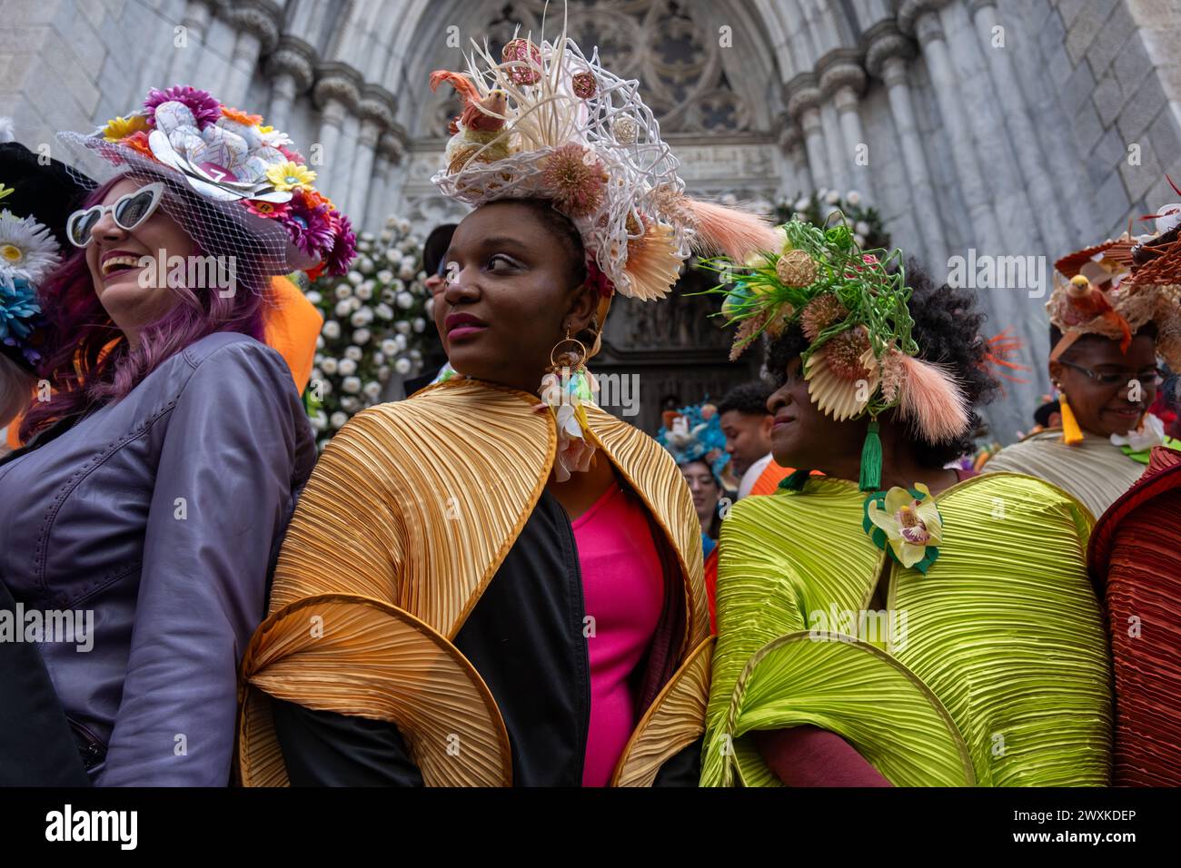 New York City, United States. 31st Mar, 2024. A group of women are dressed up for Easter on the steps of St. Patrick's Cathedral. New York's Easter Parade and Bonnet Festival dates back to the 1870s. An Anual event, New Yorkers don colorful and creative Easter outfits to show off in front of St Patrick's Cathedral on Fifth Avenue. (Photo by Syndi PIilar/SOPA Images/Sipa USA) Credit: Sipa USA/Alamy Live News Stock Photo