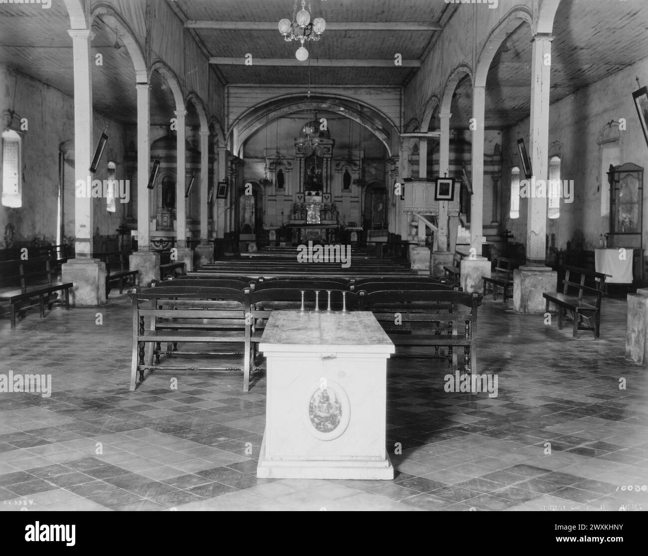 Original caption: Taken at the Barasoain Church, Malolos, Province of Bulacan, P.I. (Padre Carlos Inquimboy (secular) Parish Priest). The Barasoain Church (now restored to religious uses) holds a prominent place int eh historical annals of the Filipino people. It was in this church that the Delegates to the first Assembly of Representatives passed the Constitucion Politica de la Republica Filipina: sanctioned on Jan. 21, 1898 ca. 1929 Stock Photo