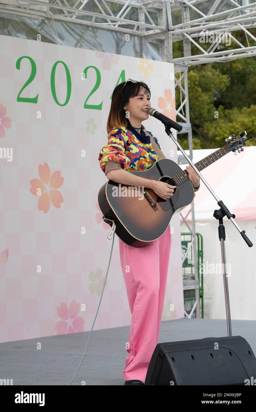 Ueno, Tokyo, Japan, 1 April 2024. PiA the Taiwanese singer songwriter performs her final concert at Ueno Park cherry blossom festival this morning at the end of a short tour of Tokyo, Japan. Very popular in her home country Taiwan, she will be returning to Japan in May to perform in Kyoto, and other cities. Credit-Malcolm Fairman, Alamy Live News. Stock Photo