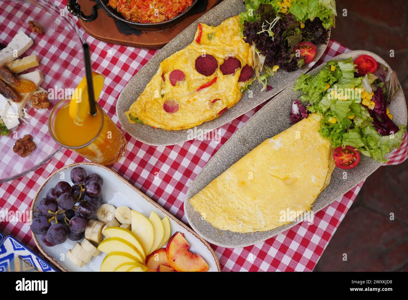 Egg Omelette with sausage on a breakfast table  Stock Photo