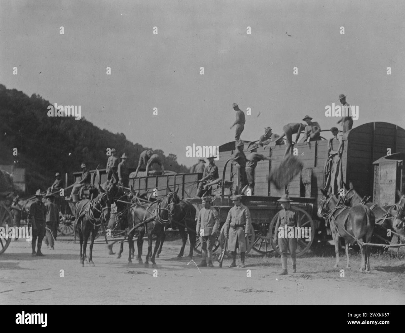 Soldiers unloading hay hi-res stock photography and images - Alamy