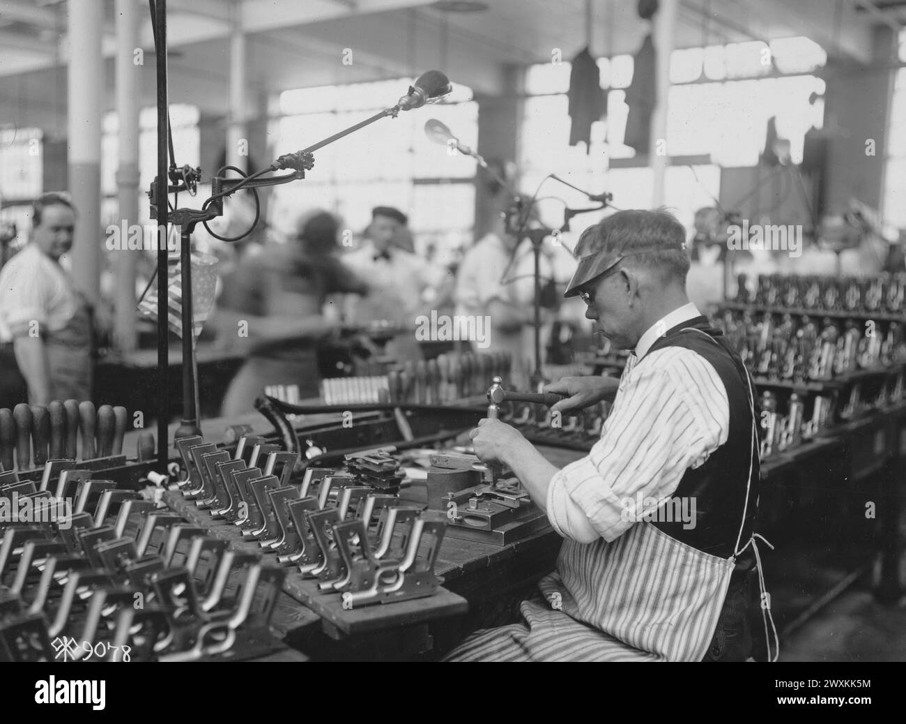 Manufacturing Colt .45 pistols at the Colt Firearms Plant in Hartford