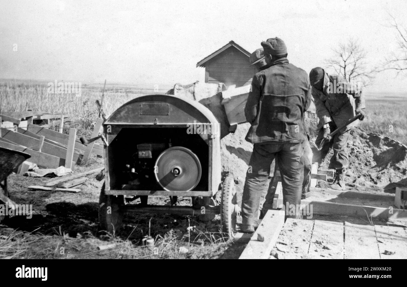 Men working on a Community Housing Project Barn on the Sisseton