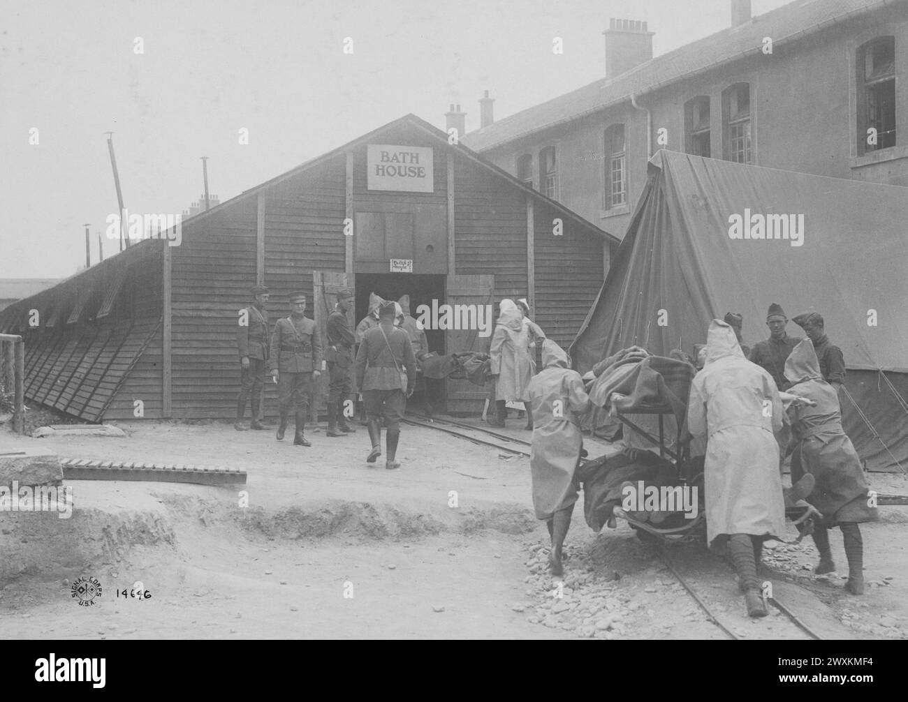 Patients being taken into bath and treatment rooms at American evacuation hospital #2 in Baccarat France ca. 1918 Stock Photo