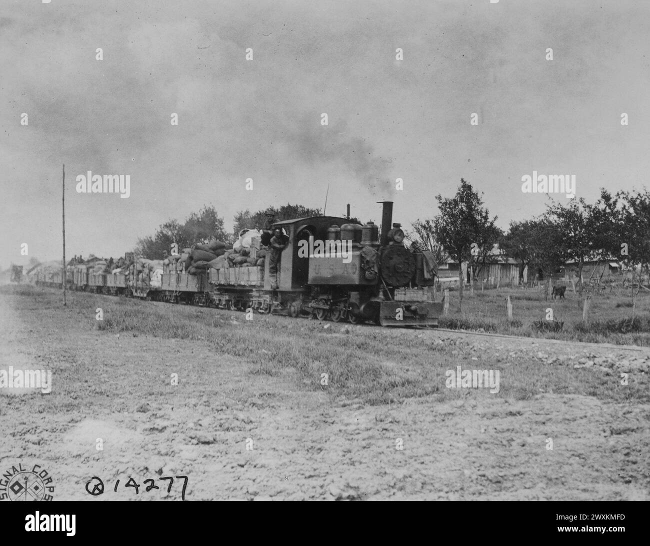 A narrow gauge train starting out on its daily run along the front with foodstuffs; Menil-la-Tour, France ca. 1918 Stock Photo