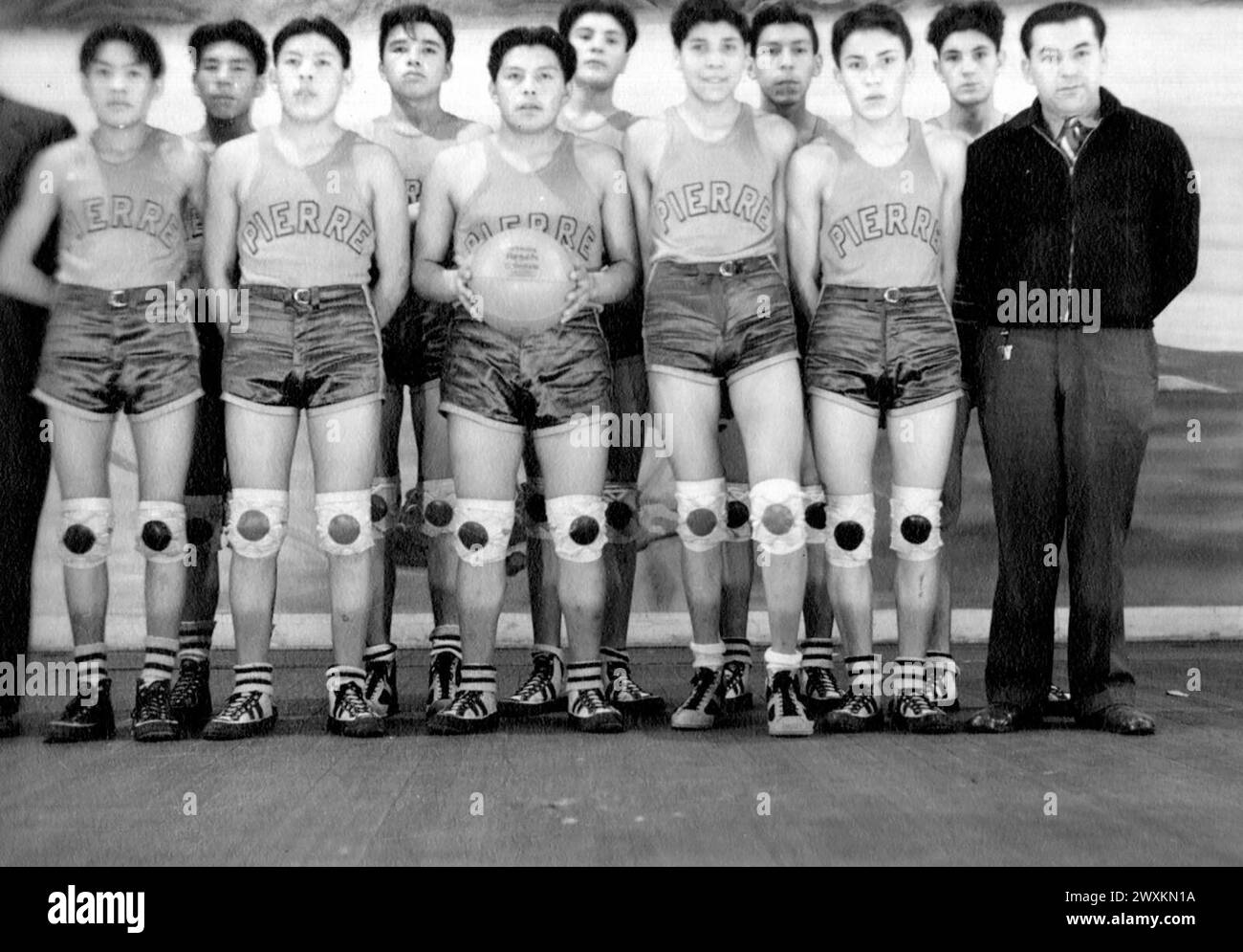 Basketball team photo for an Indian school in Pierre South Dakota ca