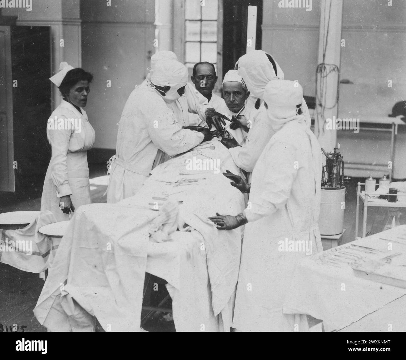 American Red Cross in France Doctor operating on a soldier in