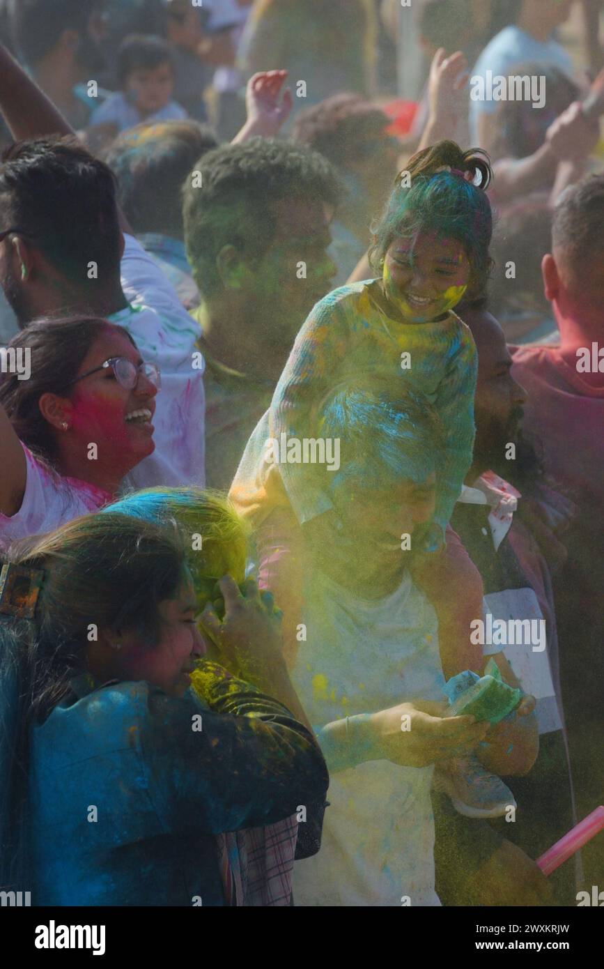 People celebrating Festivals of colors Holi at Sri Durga Mata Temple in ...