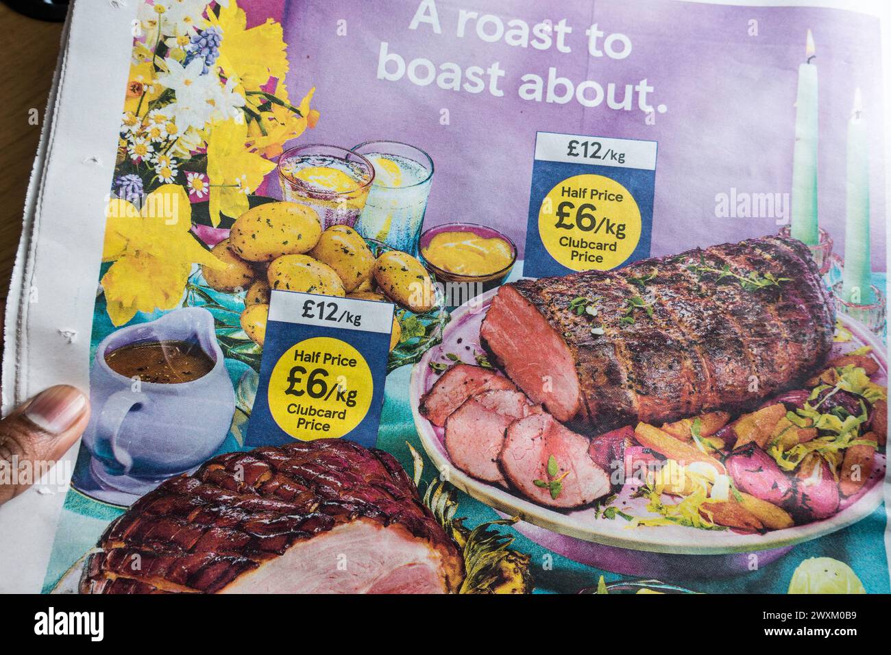 Tesco Clubcard Pricing advertisement during Easter 2024 Stock Photo