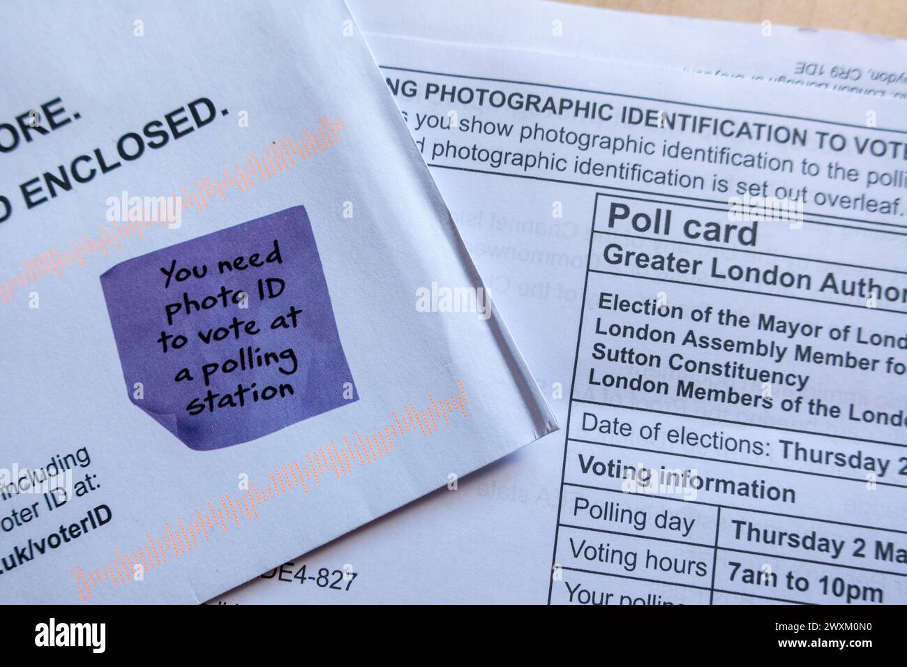 Poll Card mentioning photo id requirement to vote Stock Photo