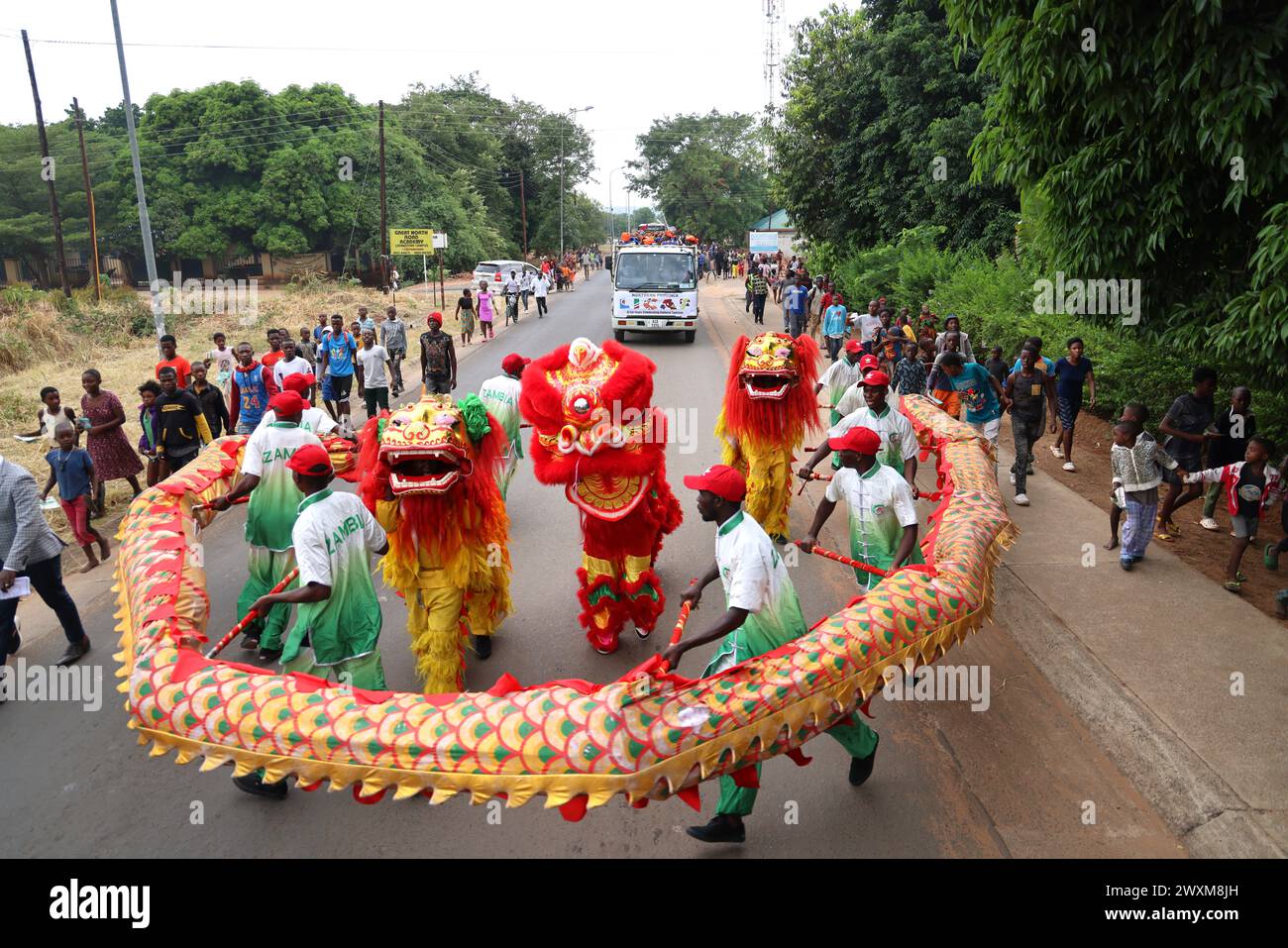 Livingstone, Zambia. 30th Mar, 2024. People watch dragon and lion