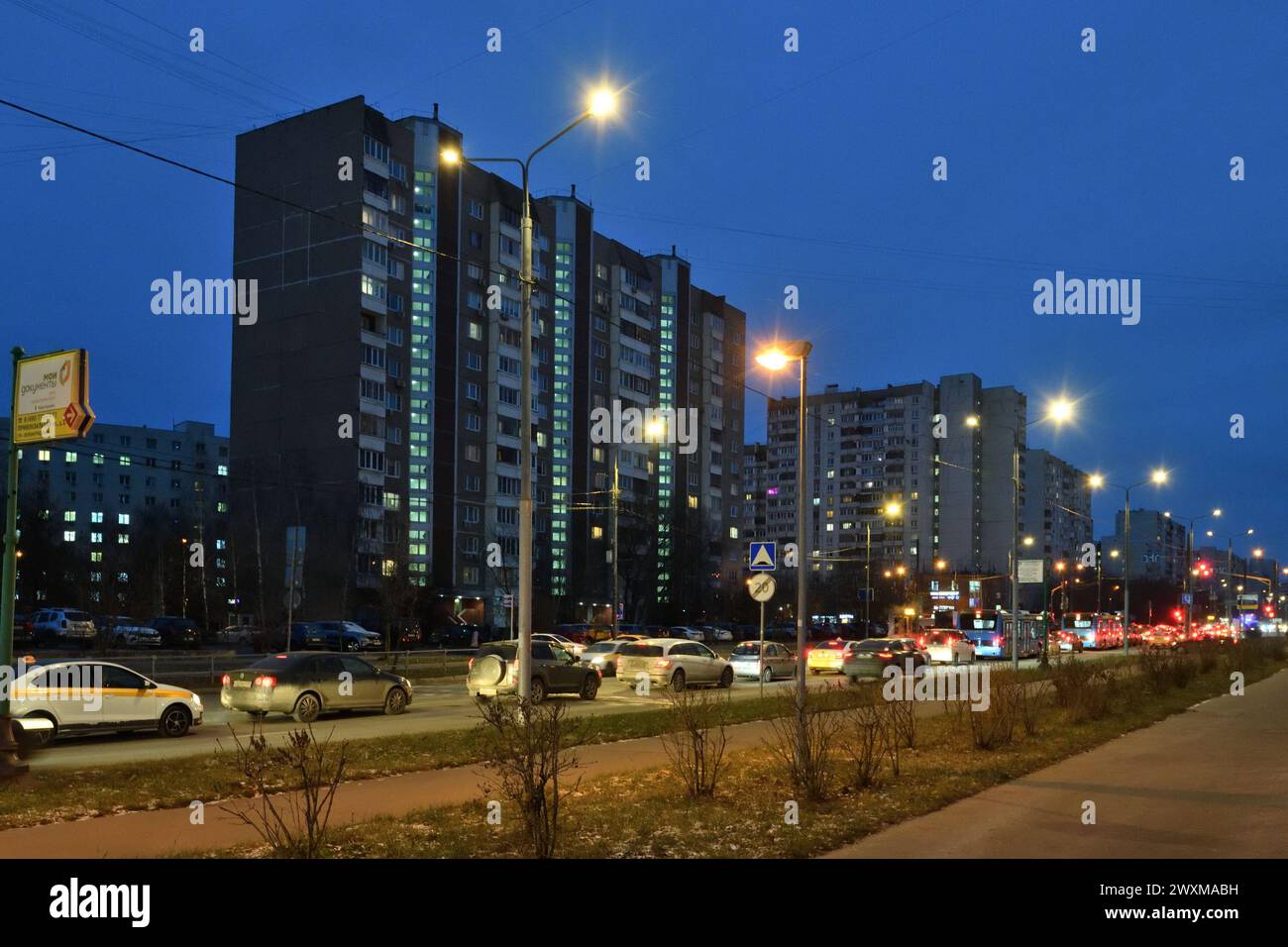 Moscow, Russia - Nov 21. 2023. Evening traffic on the Kamenka street in Zelenograd Stock Photo