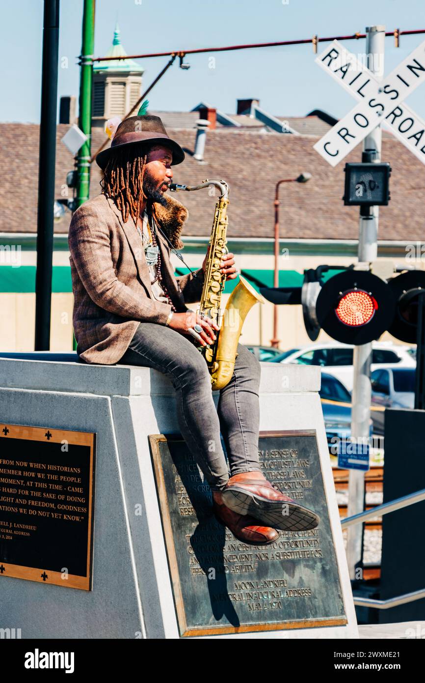 African American musician street performer playing sax, New Orleans Stock Photo