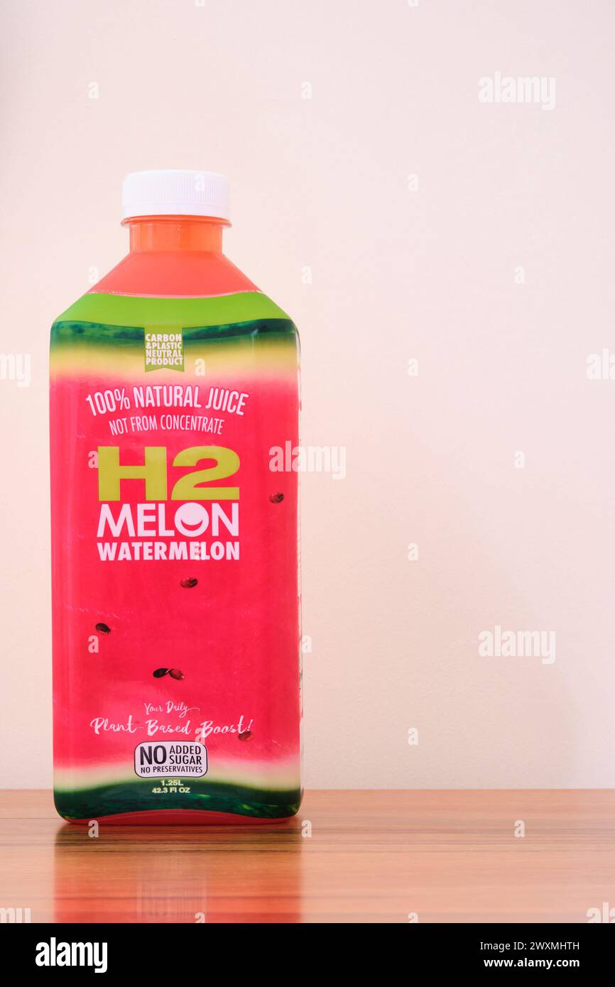 Watermelon juice from the Australian H2coco company, a carbon and plastic neutral product with no added sugar and 100% juice, not from concentrate. Stock Photo