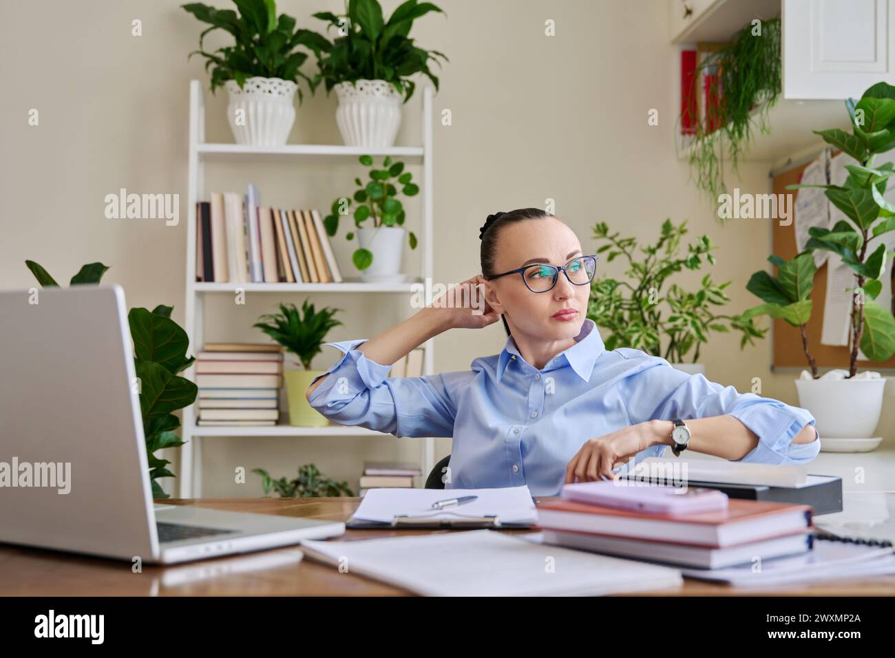 Computer Support Calm Calm relaxed business woman in workplace, at desk with computer Stock ...