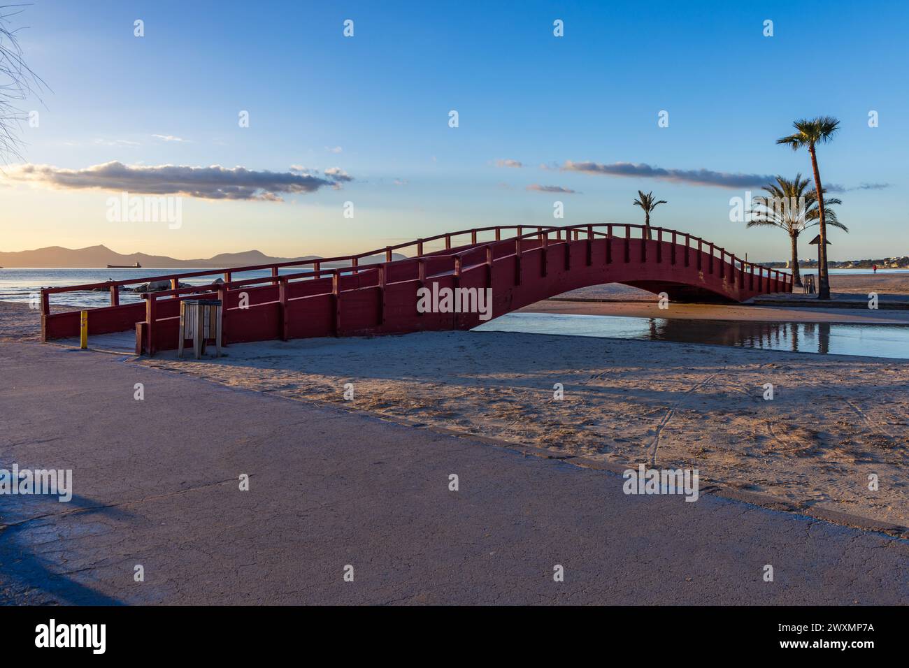 Red footbridge at Alcudia beach, Majorca island, Spain Stock Photo