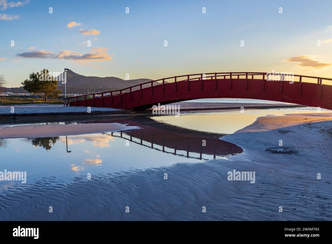 Red footbridge at Alcudia beach, Majorca island, Spain Stock Photo