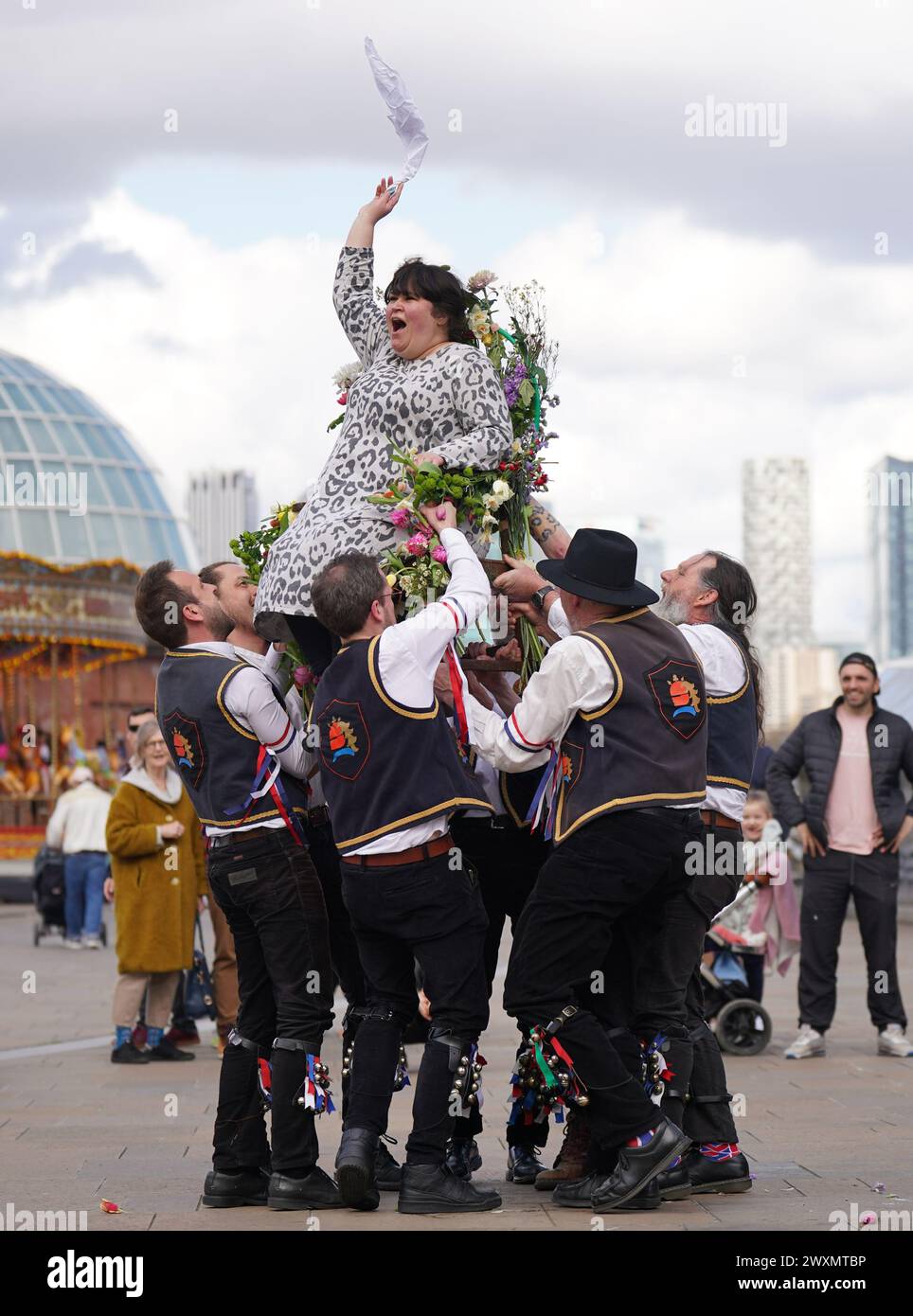 Members of the Blackheath Morris Men lift Liberty Rowley, from London ...