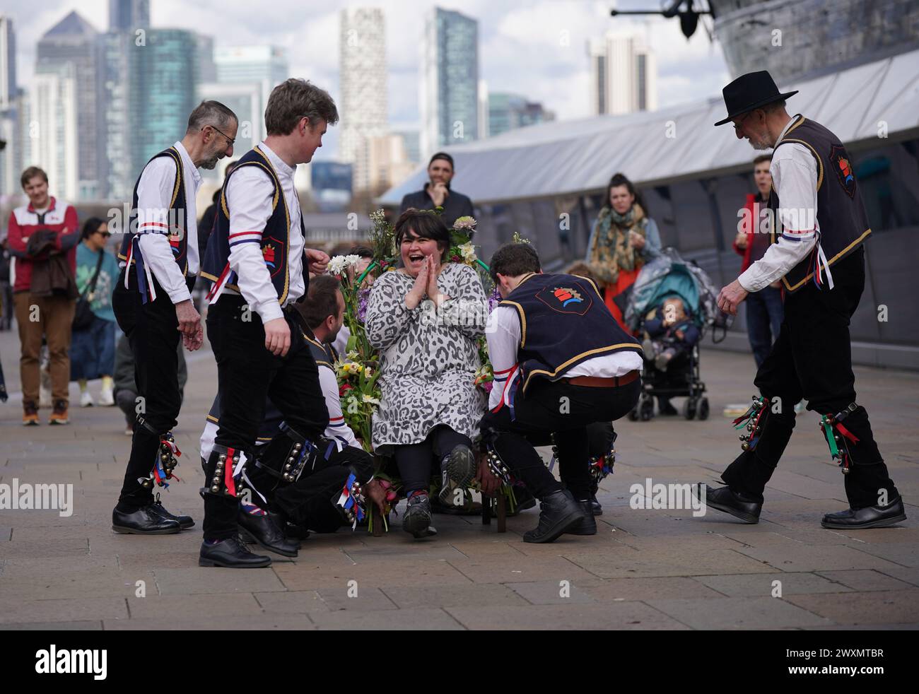 Members of the Blackheath Morris Men lift Liberty Rowley, from London ...