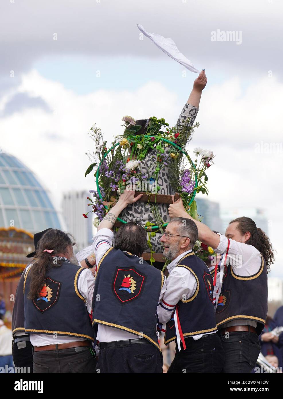 Members of the Blackheath Morris Men lift Liberty Rowley, from London ...