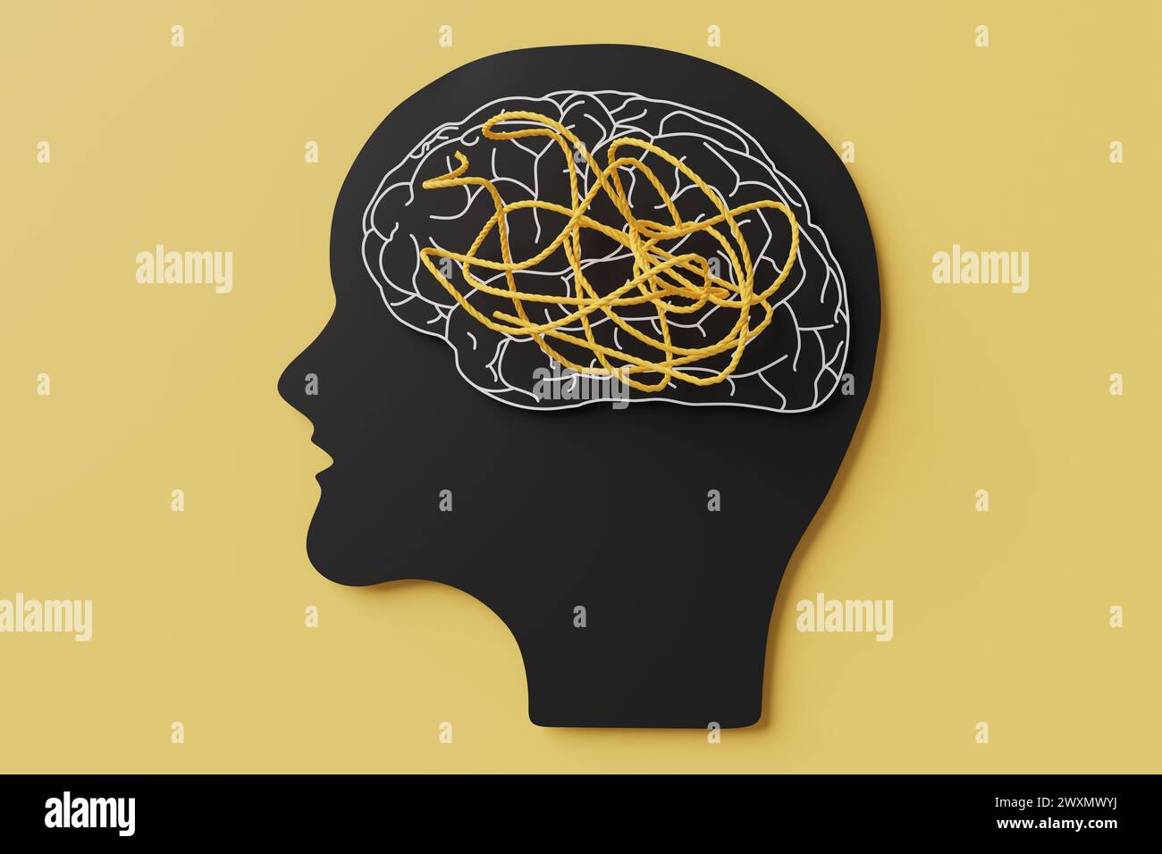Orange ropes on a black paper cutting of a human head with a brain outlined in white on yellow background. Mental illness, psychology and ADHD Stock Photo