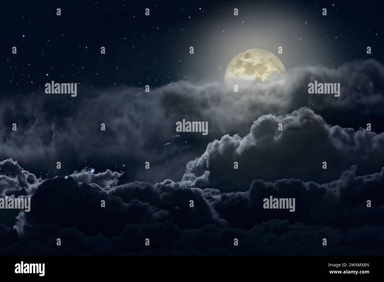 Full moon night with strong clouds and stars Stock Photo - Alamy