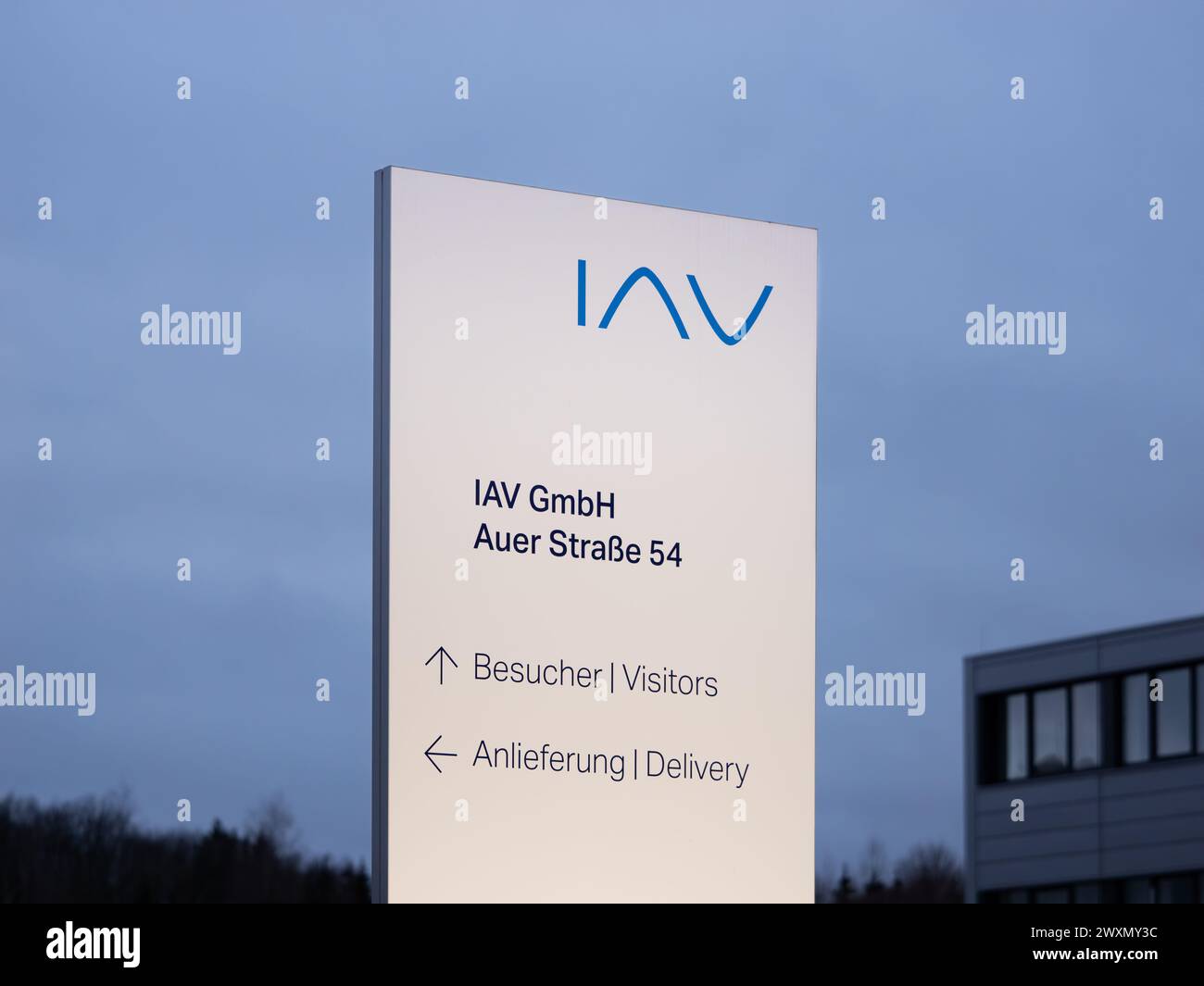 IAV company signboard with the logo and address on it. The engineering company is a big employer in the region and operates in the automotive industry Stock Photo