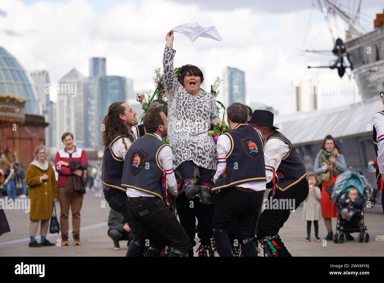 Members of the Blackheath Morris Men lift Liberty Rowley, from London ...