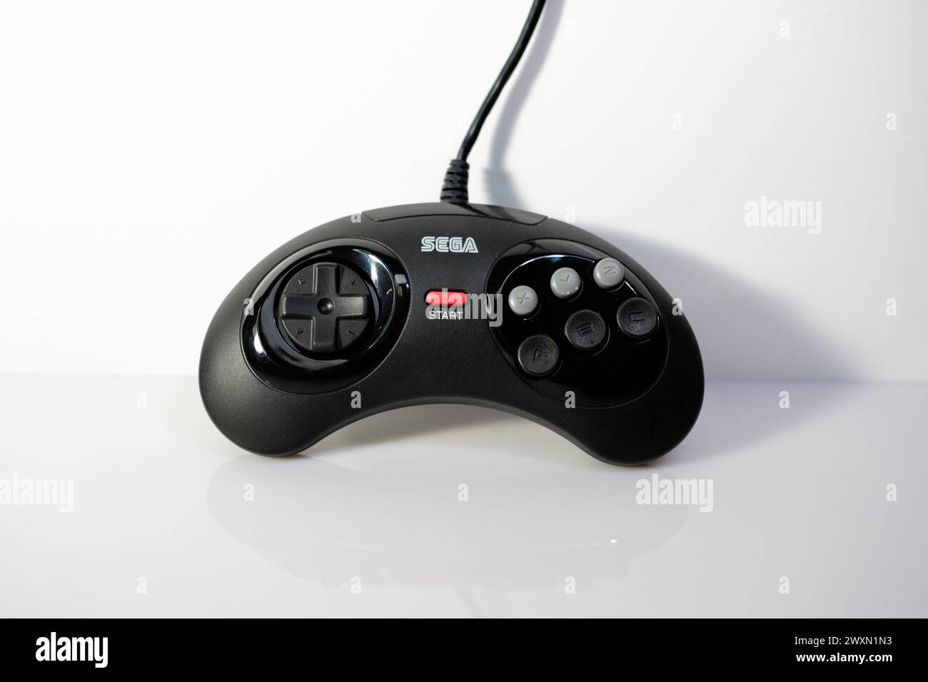 Newcastle UK: 21st Jan 2024: A closeup of a Sega Mega Drive 6 button controller. Retro gaming. Megadrive Stock Photo
