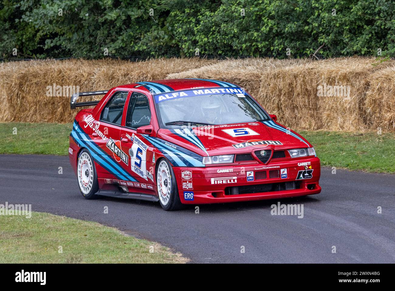 Kuno Schar in the 1992 Alfa Romeo 155 GTA S1 touring car racer at the 2023 Goodwood Festival of Speed, Sussex, UK Stock Photo